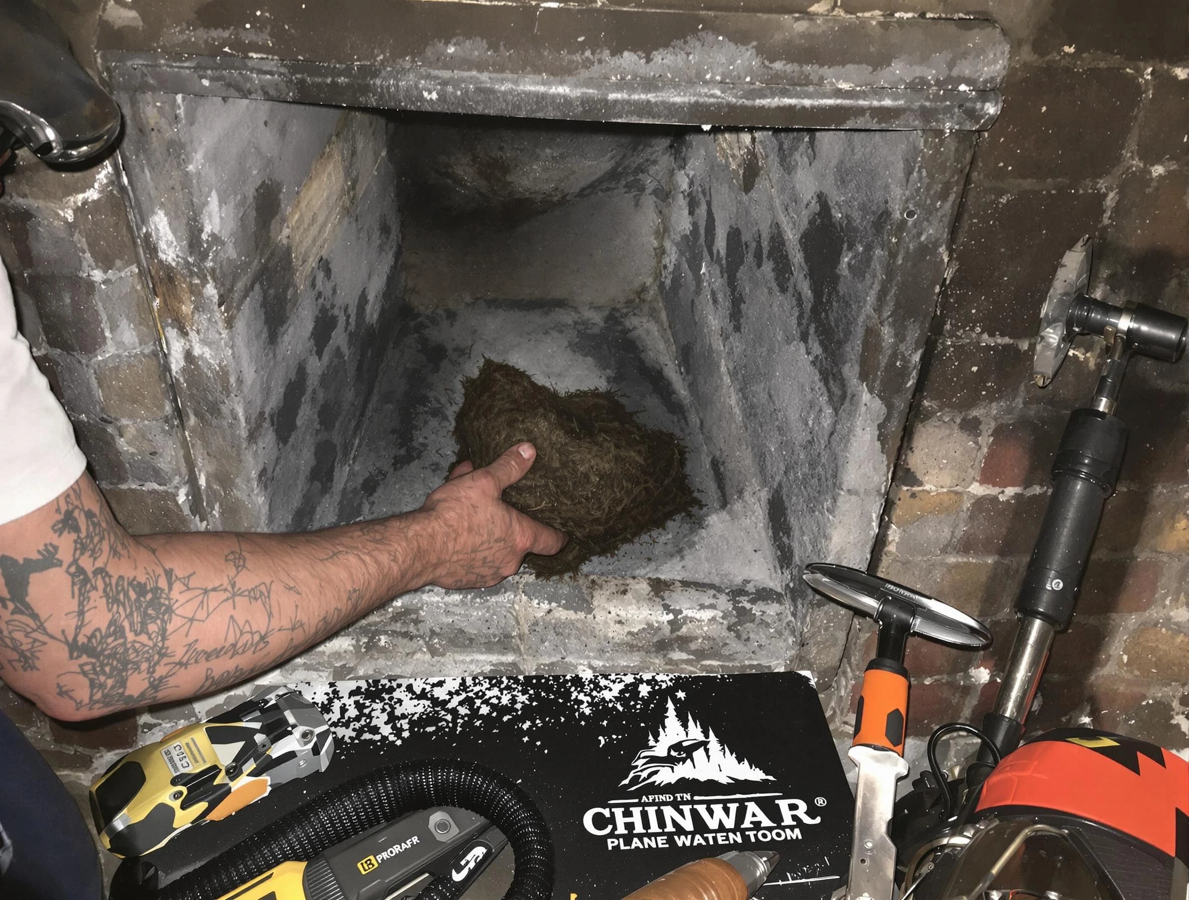 Shaler Chimney Sweep safely removing debris and screening chimney in Shaler, PA